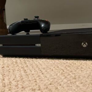 Xbox one with all power cords and everything that came with it and 9 video games
